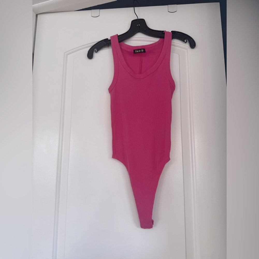 Suzi Kondi Pink Ribbed Bodysuit   Sz XS
NWOT!